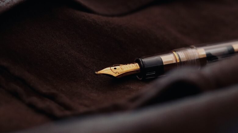 Elegant writing instrument representing Celestia Edinburgh's rich restaurant history and Indian culinary journey